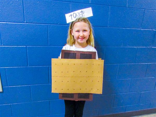 Students and teachers dressing up for a vocabulary parade. 